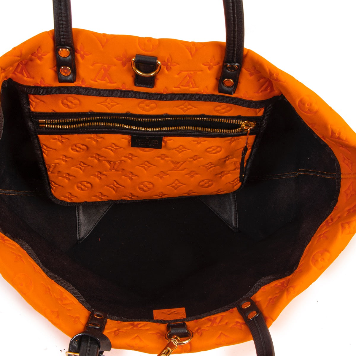 Buy online authentic second hand Louis Vuitton Limited Edition Orange Mono Neoprene Scuba MM Bag in very good condition at Labellov in Antwerp