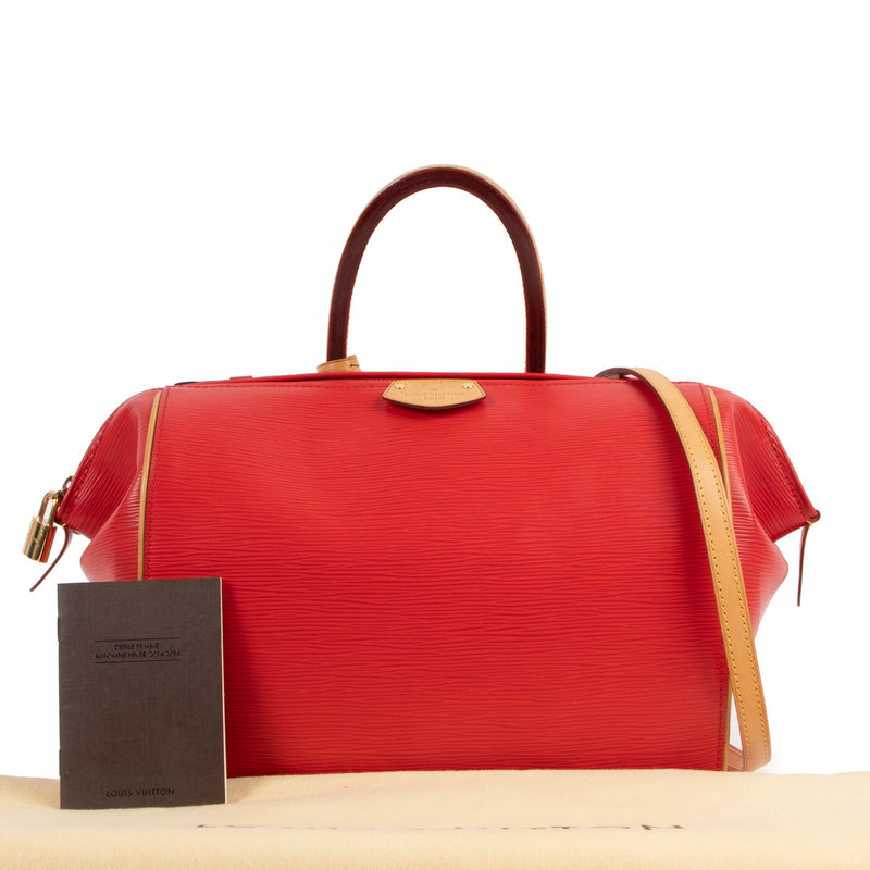 Louis Vuitton Fall/Winter 2014 Coquelicot Epi Doc PM Bag for the best price at Labellov secondhand luxury in Antwerp. We buy and sell your authentic designer bags online.