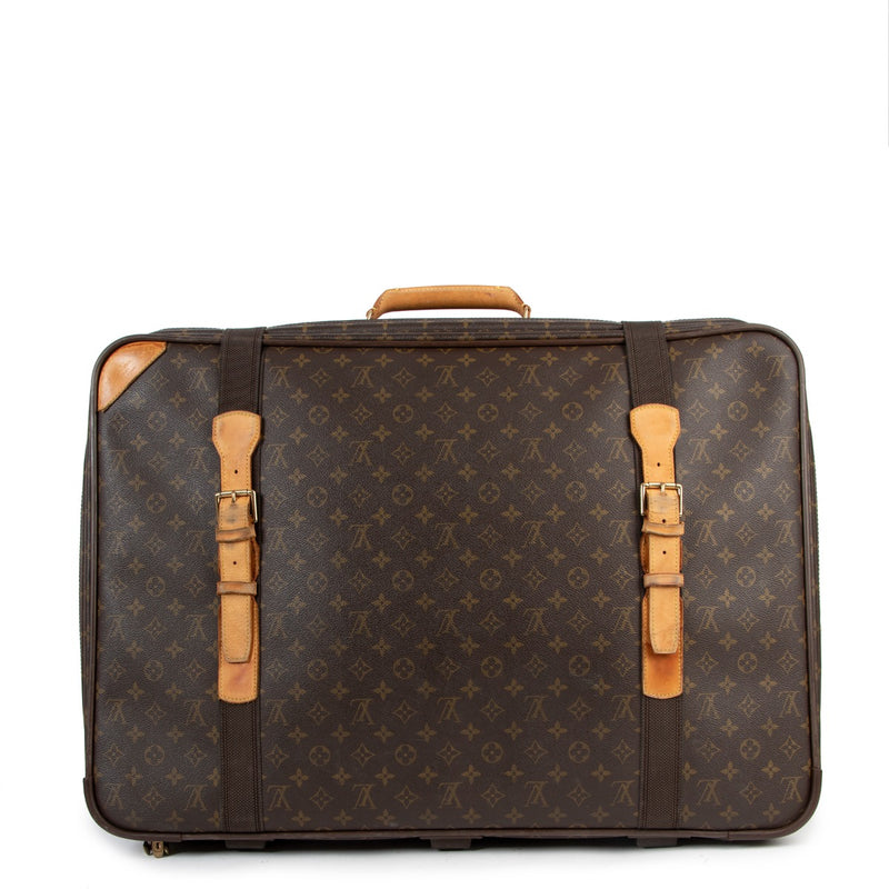 Buy online authentic second hand Louis Vuitton Satellite 70 Monogram Canvas Suitcase Travel Bag in very good condition at Labellov in Antwerp