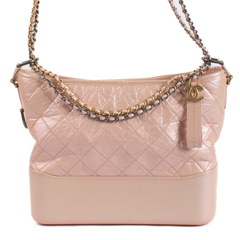 Shop safe online at Labellov in Antwerp, Brussels and Knokke this 100% authentic second hand Chanel Pearly Pink Large Gabrielle Bag