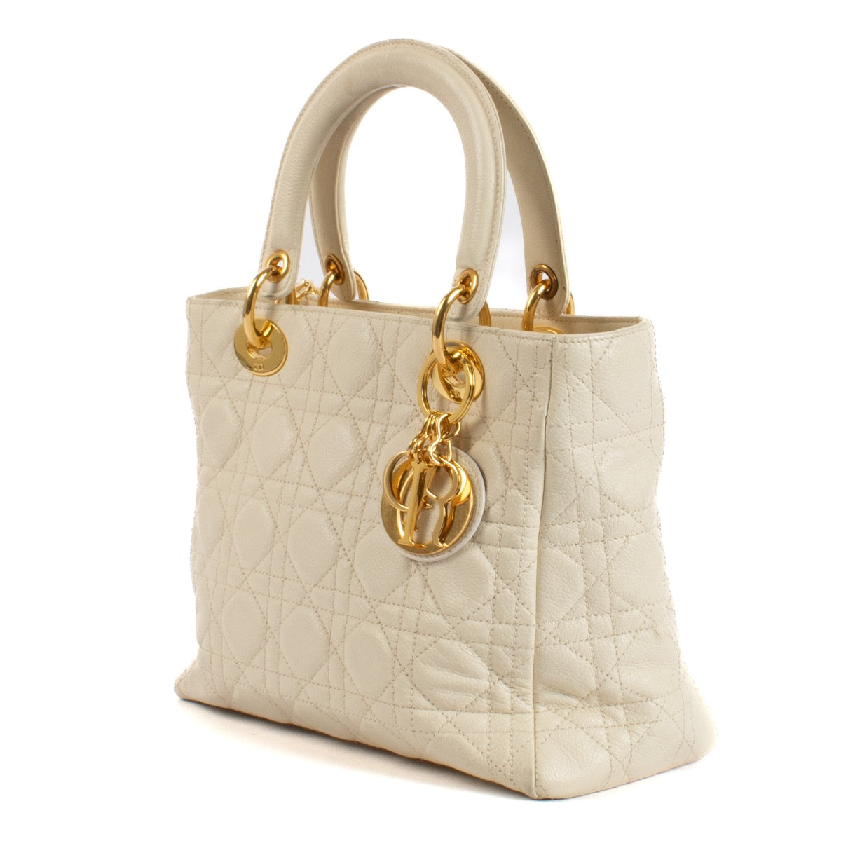 Shop safe online at Labellov in Antwerp, Brussels and Knokke this 100% authentic second hand Christian Dior Vintage Latte Calfskin Cannage Supple Medium Lady Dior Bag