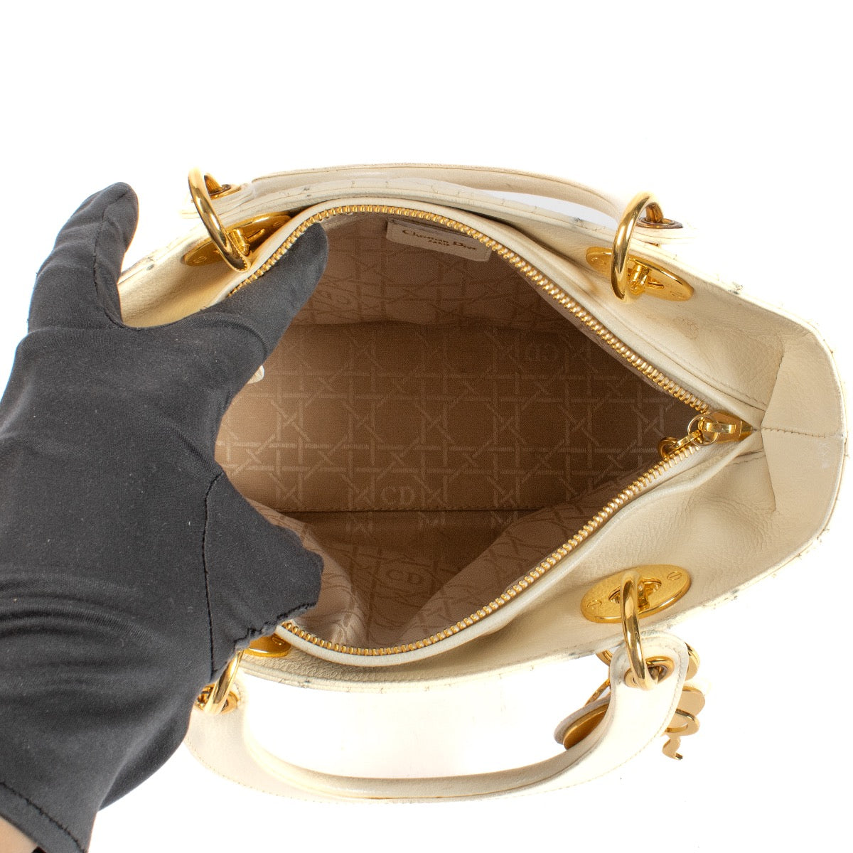 Shop safe online at Labellov in Antwerp, Brussels and Knokke this 100% authentic second hand Christian Dior Vintage Latte Calfskin Cannage Supple Medium Lady Dior Bag