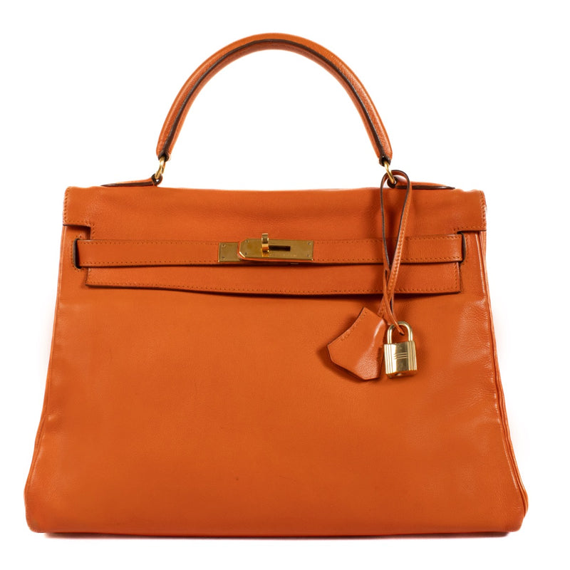 Shop safe online at Labellov in Antwerp, Brussels and Knokke this 100% authentic second hand Hermès Kelly 32 Orange Swift GHW