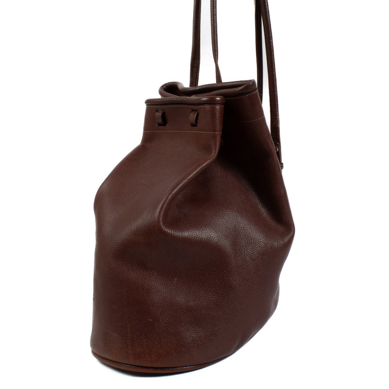 Discover the elegance of this deep Burgundy leather backpack, featuring a structured silhouette and luxurious gold hardware. Perfect for both everyday use and special occasions, this timeless designer piece adds sophistication to any outfit. Shop now on L