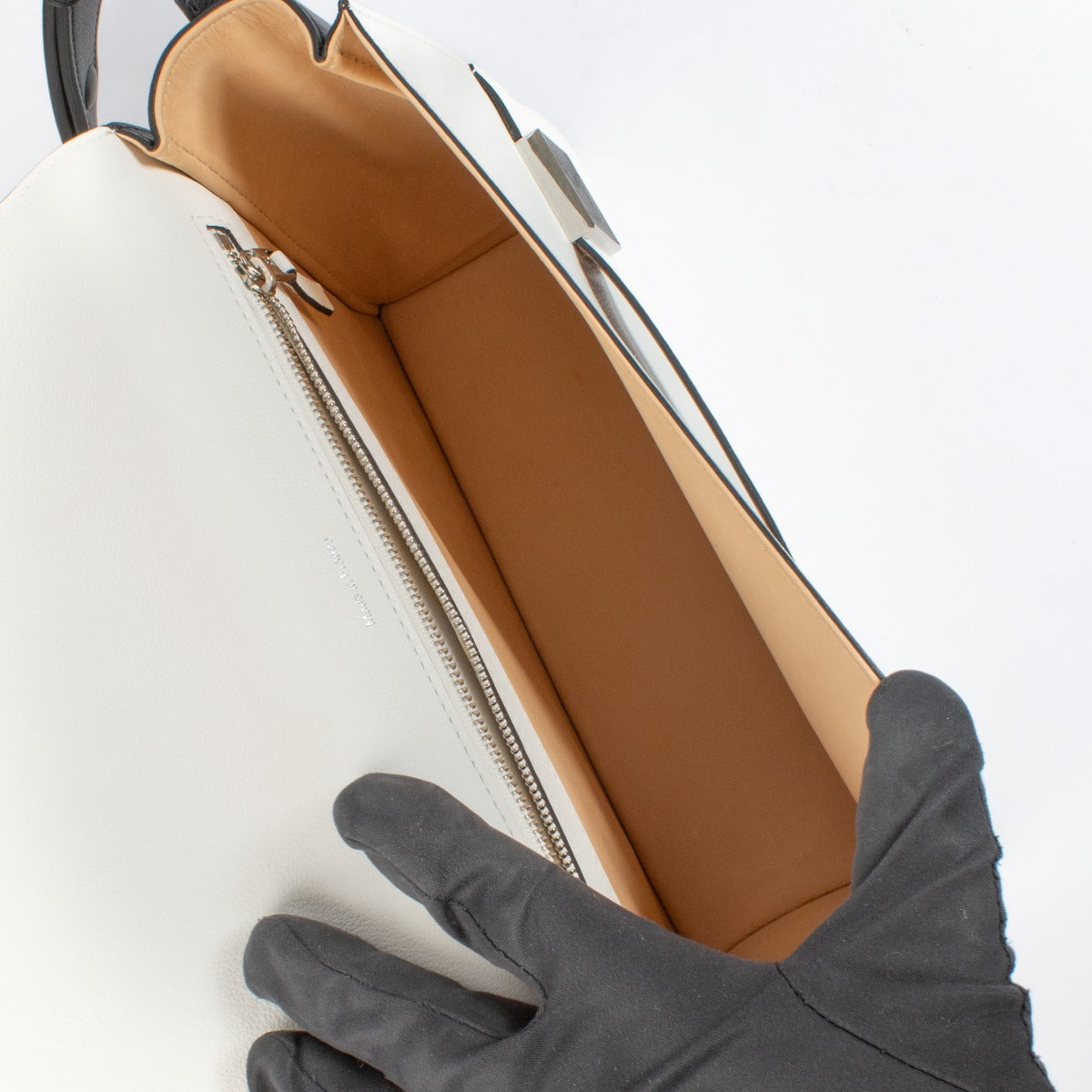 Delvaux Tri-Color Polo Madame PM handbag in leather with gold-tone hardware and a structured silhouette. Shop now on Labellov.com.