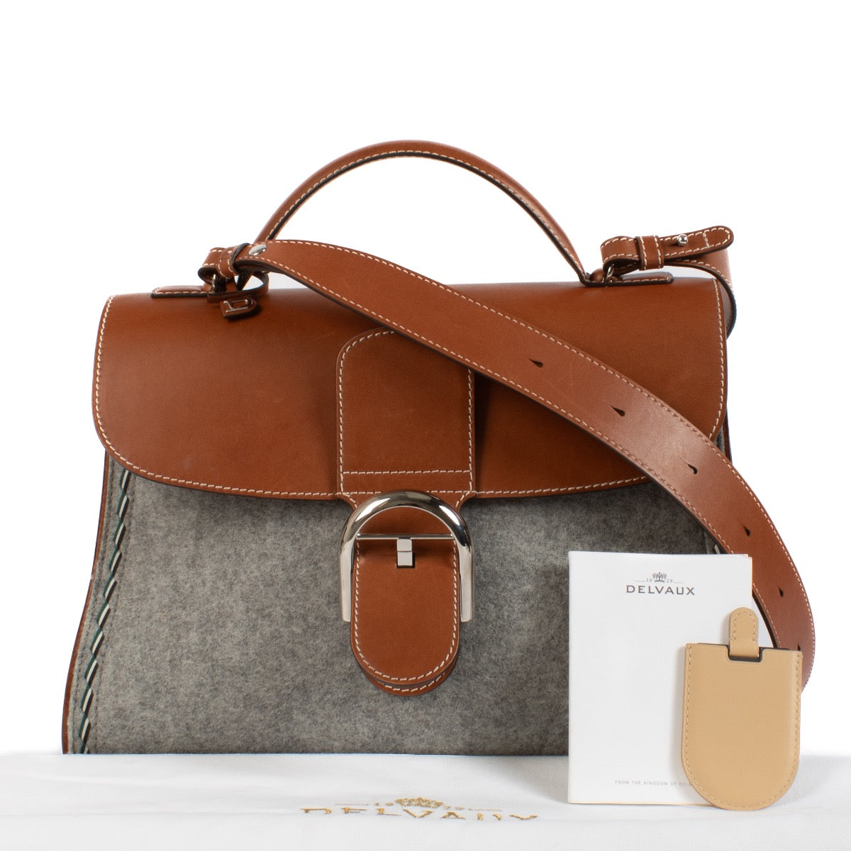 We buy and sell your preloved and brand new designer Delvaux Grey Felt Siera Calf Brillant GM