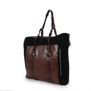 Shop safe online at Labellov in Antwerp this 100% authentic second hand Dries Van Noten Black and Brown Travel Bag