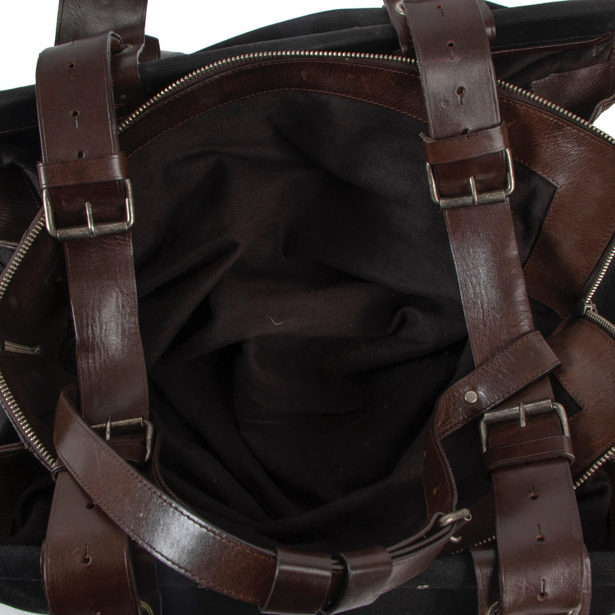 Shop safe online at Labellov in Antwerp this 100% authentic second hand Dries Van Noten Black Canvas Travel Bag