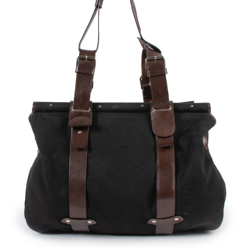Shop safe online at Labellov in Antwerp this 100% authentic second hand Dries Van Noten Black Canvas Travel Bag