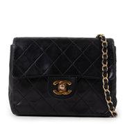 Buy an authentic second hand Chanel Black Lambskin Mini Square Classic Flap Bag GHW in good pre-loved condition at Labellov