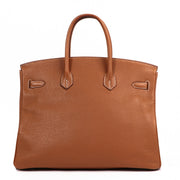 achetez seconde main luxe Hermès Birkin 35 Gold Taurillon Clemence Palladium Hardware chez labellov