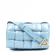 Buy an authentic second-hand Bottega Veneta Blue Lambskin Leather Padded Cassette Crossbody Bag in very good condition at Labellov in Antwerp.