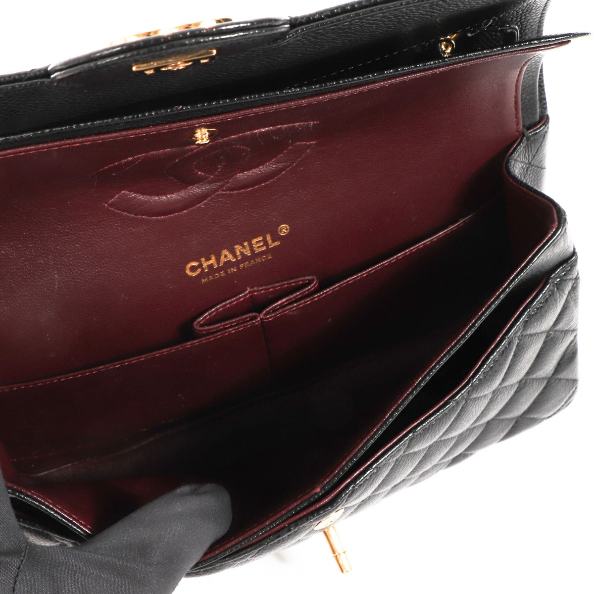 Authentic second hand luxury designer Chanel Black Caviar Classic Flap Bag on labellov.com