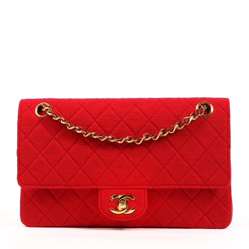 Buy an authentic second hand Chanel Red Fabric and Leather Medium Classic Flap Bag in very good condition at Labellov.com