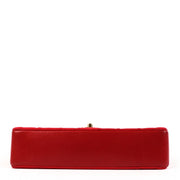 Buy an authentic second hand Chanel Red Fabric and Leather Medium Classic Flap Bag in very good condition at Labellov.com