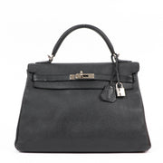 Shop authentic second hand luxury designer Hermès Kelly 32 Black Togo on labellov.com