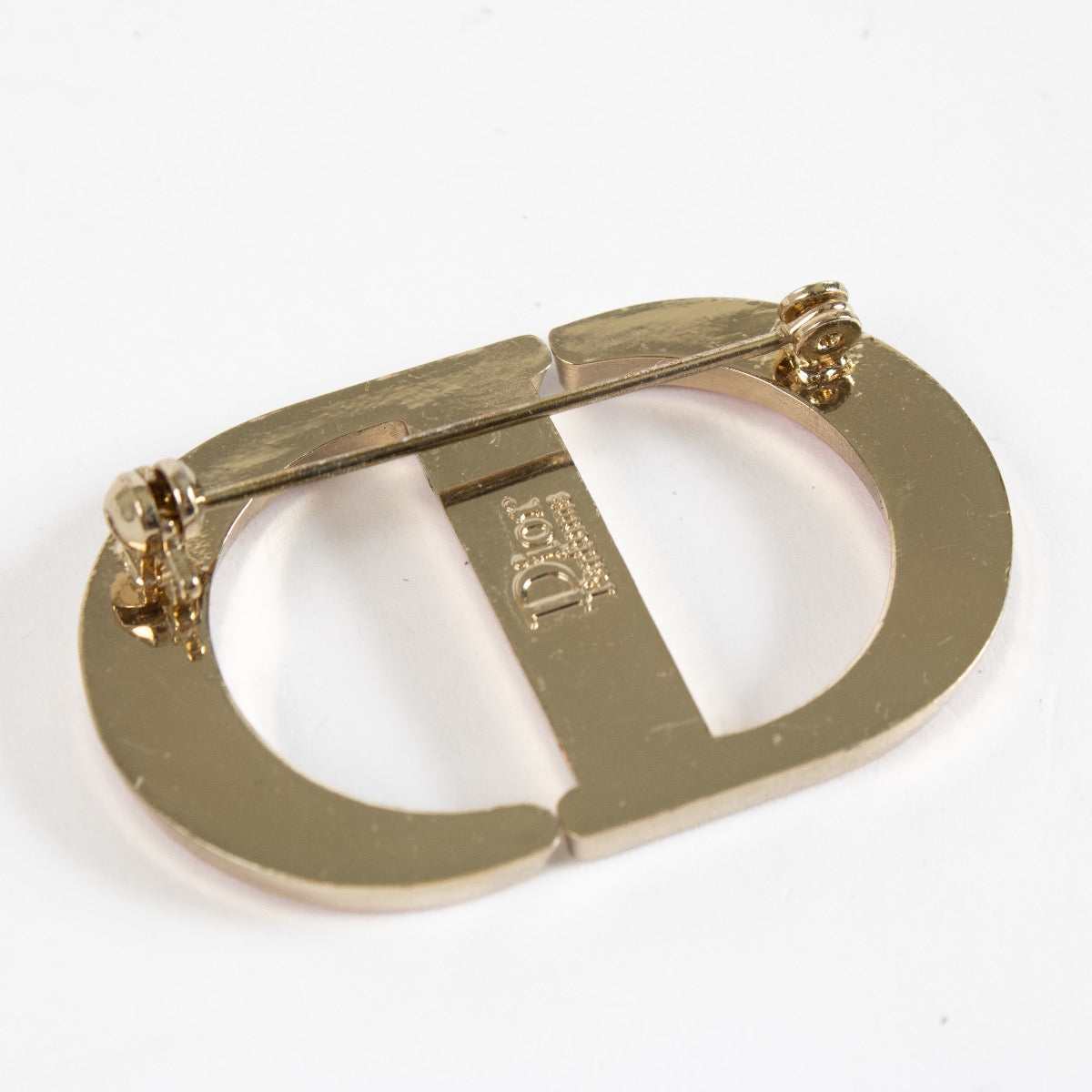 Authentic Second Hand Christian Dior Parfums Red Brooch on Labellov.com