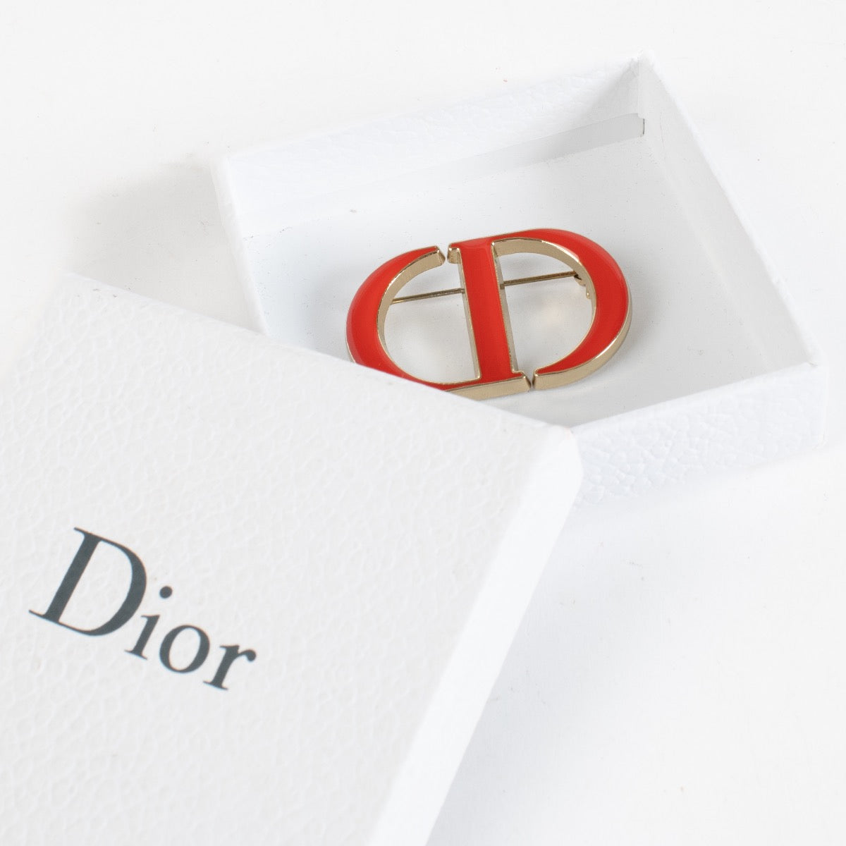 Authentic Second Hand Christian Dior Parfums Red Brooch on Labellov.com