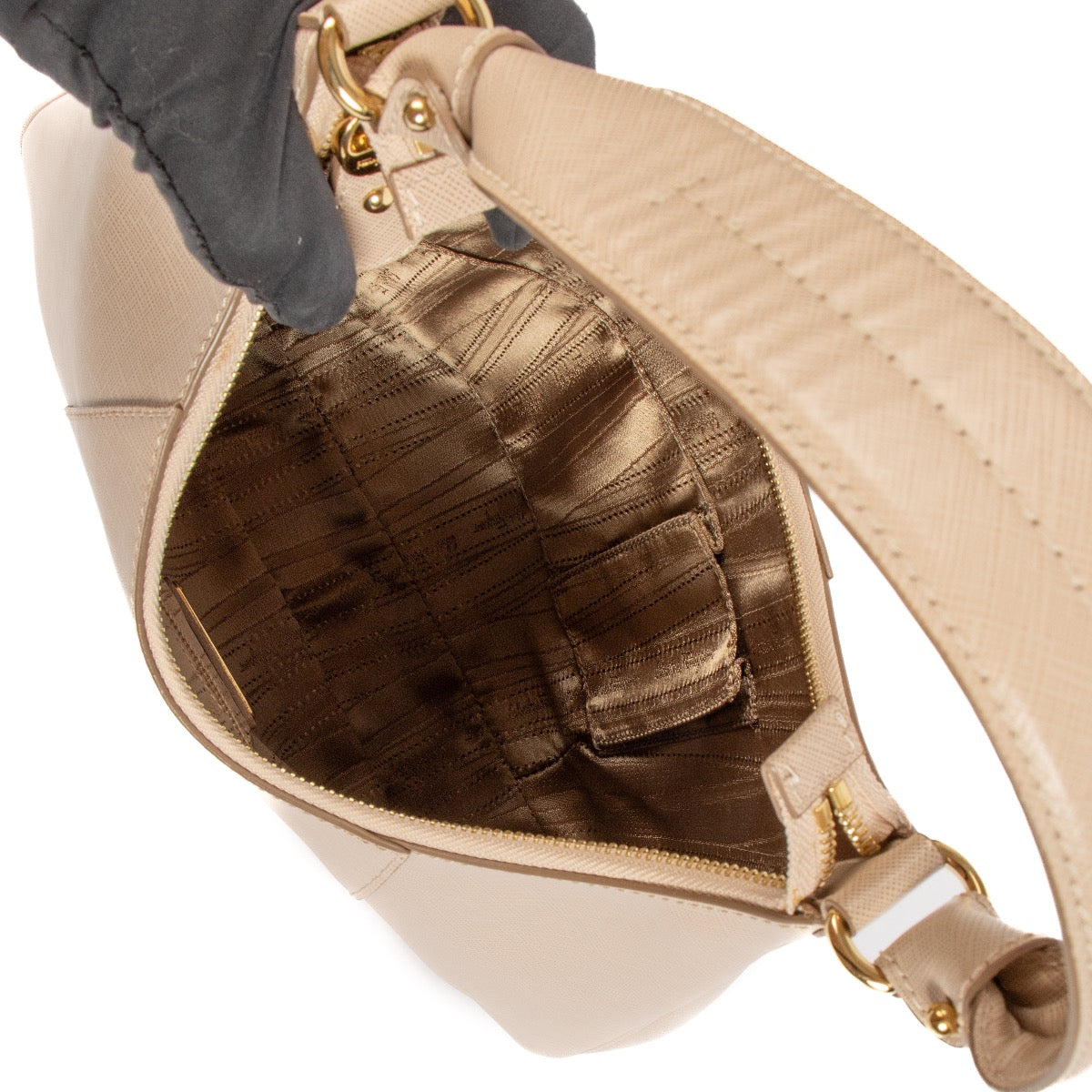 Buy a 100% authentic Ferragamo Beige Saffiano Petunia Shoulder Bag on LabelLov.com