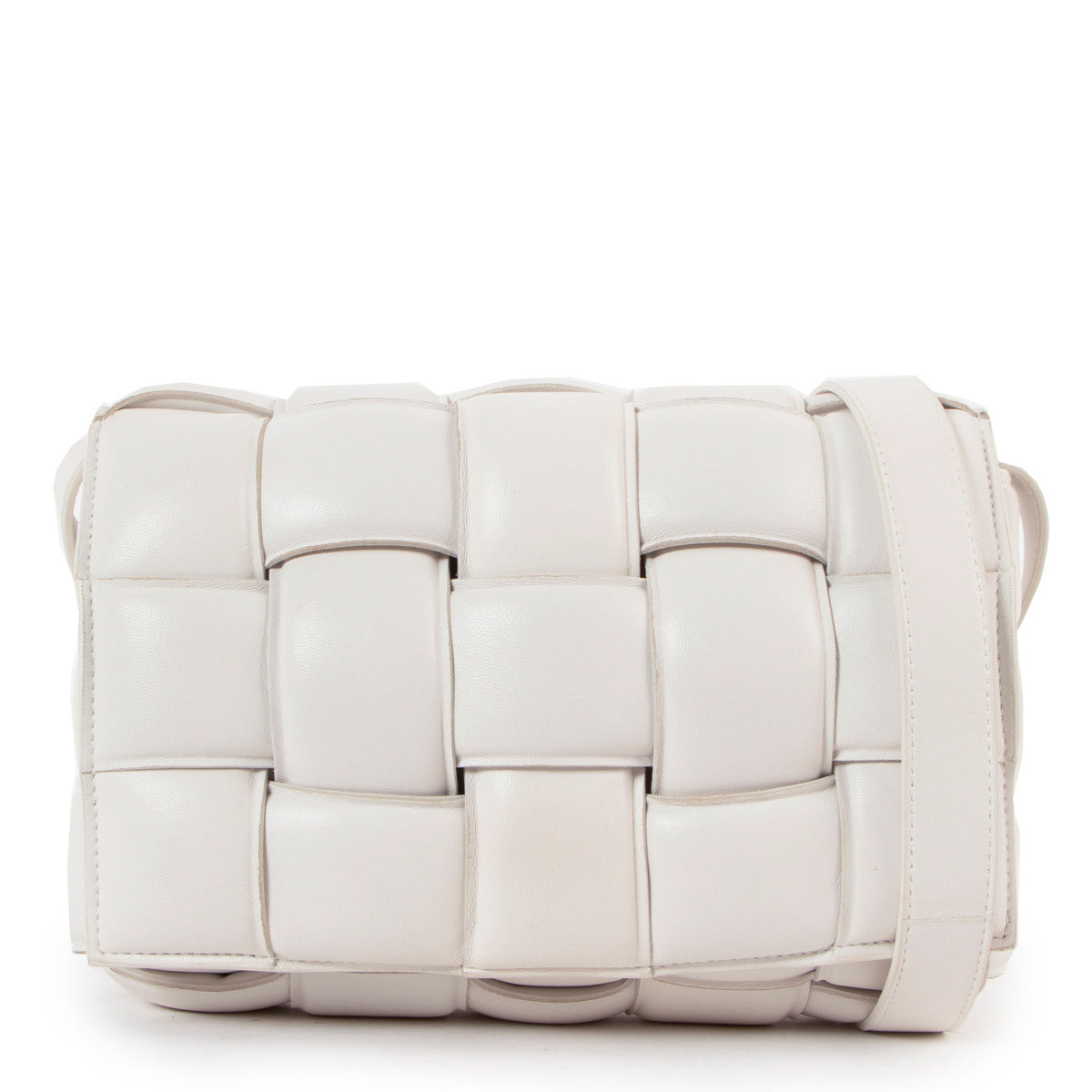 Are you looking for an authentic designer Bottega Veneta White Padded Cassette Bag? We buy and sell your authentic designer bags online for the best price.