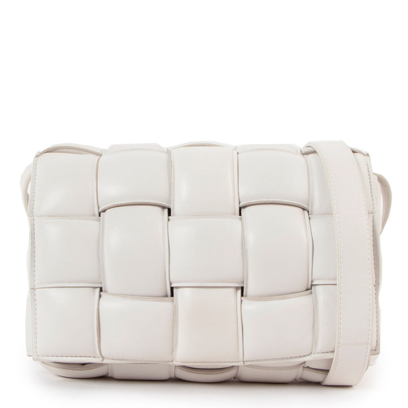 Are you looking for an authentic designer Bottega Veneta White Padded Cassette Bag? We buy and sell your authentic designer bags online for the best price.