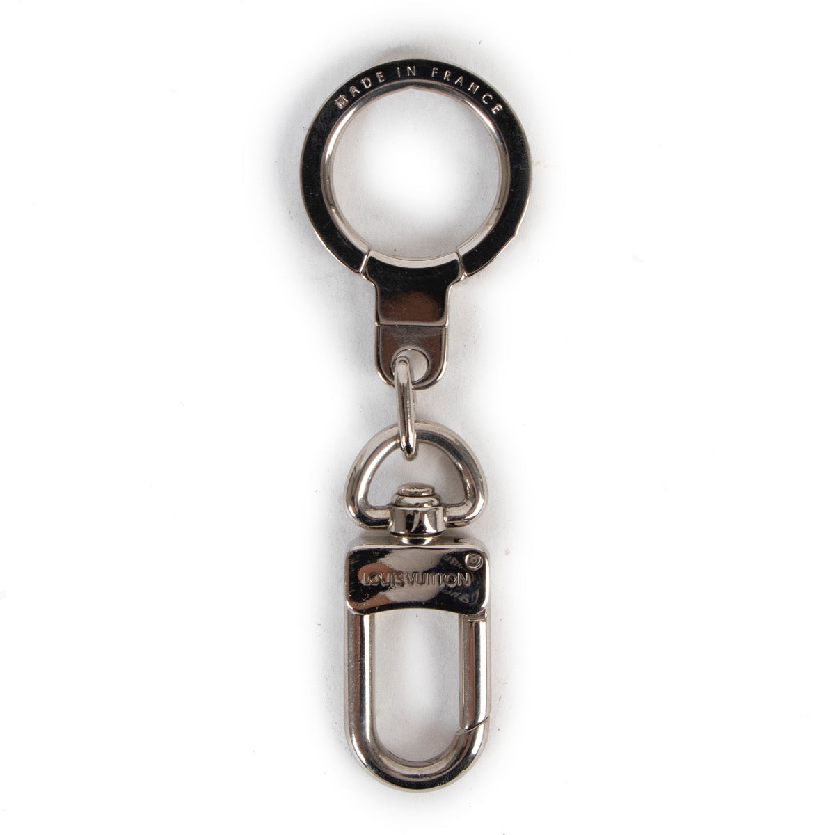 Shop safe online at Labellov in Antwerp this 100% authentic second hand Louis Vuitton Silver Key Holder, Bag Charm