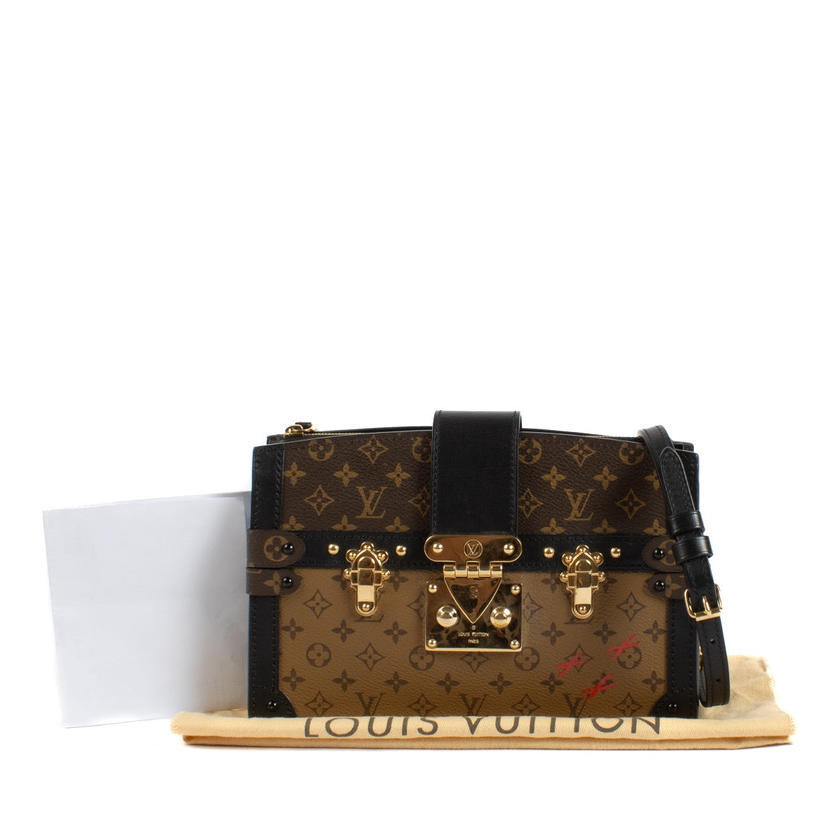 Shop safe online at Labellov in Antwerp and Knokke this 100% authentic second hand Louis Vuitton Reverse Monogram Trunk Clutch Crossbody Bag