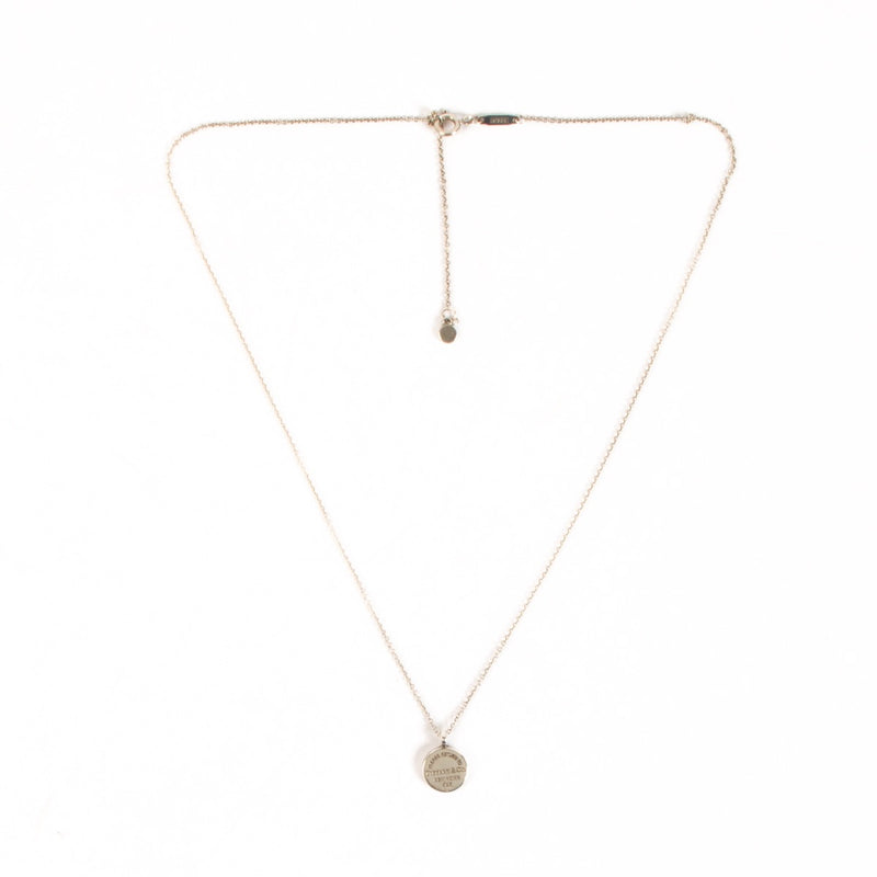 Shop safe online at Labellov in Antwerp, Brussels and Knokke this 100% authentic second hand Tiffany & Co Silver Rit Round DTag Pendant Necklace