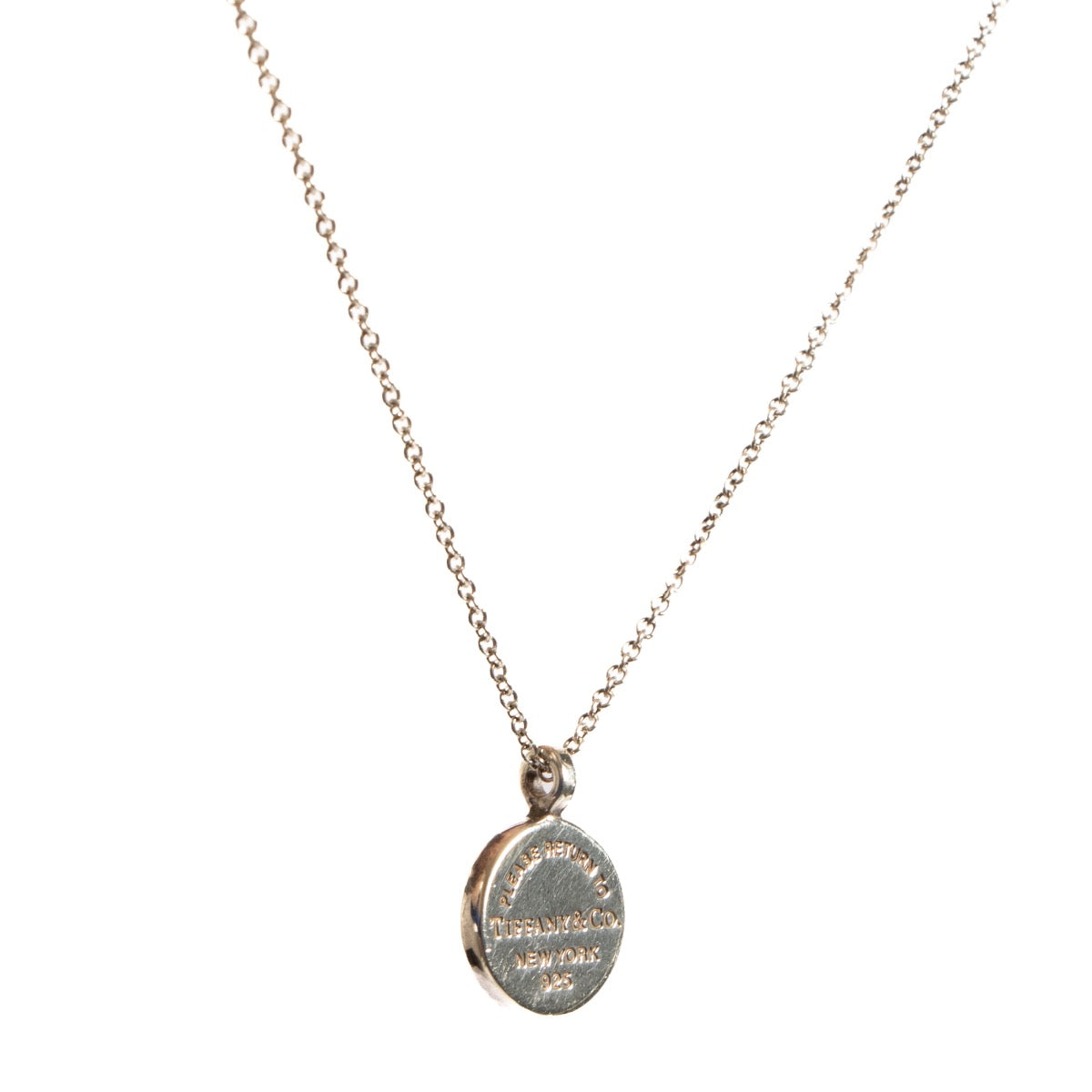 Shop safe online at Labellov in Antwerp, Brussels and Knokke this 100% authentic second hand Tiffany & Co Silver Rit Round DTag Pendant Necklace
