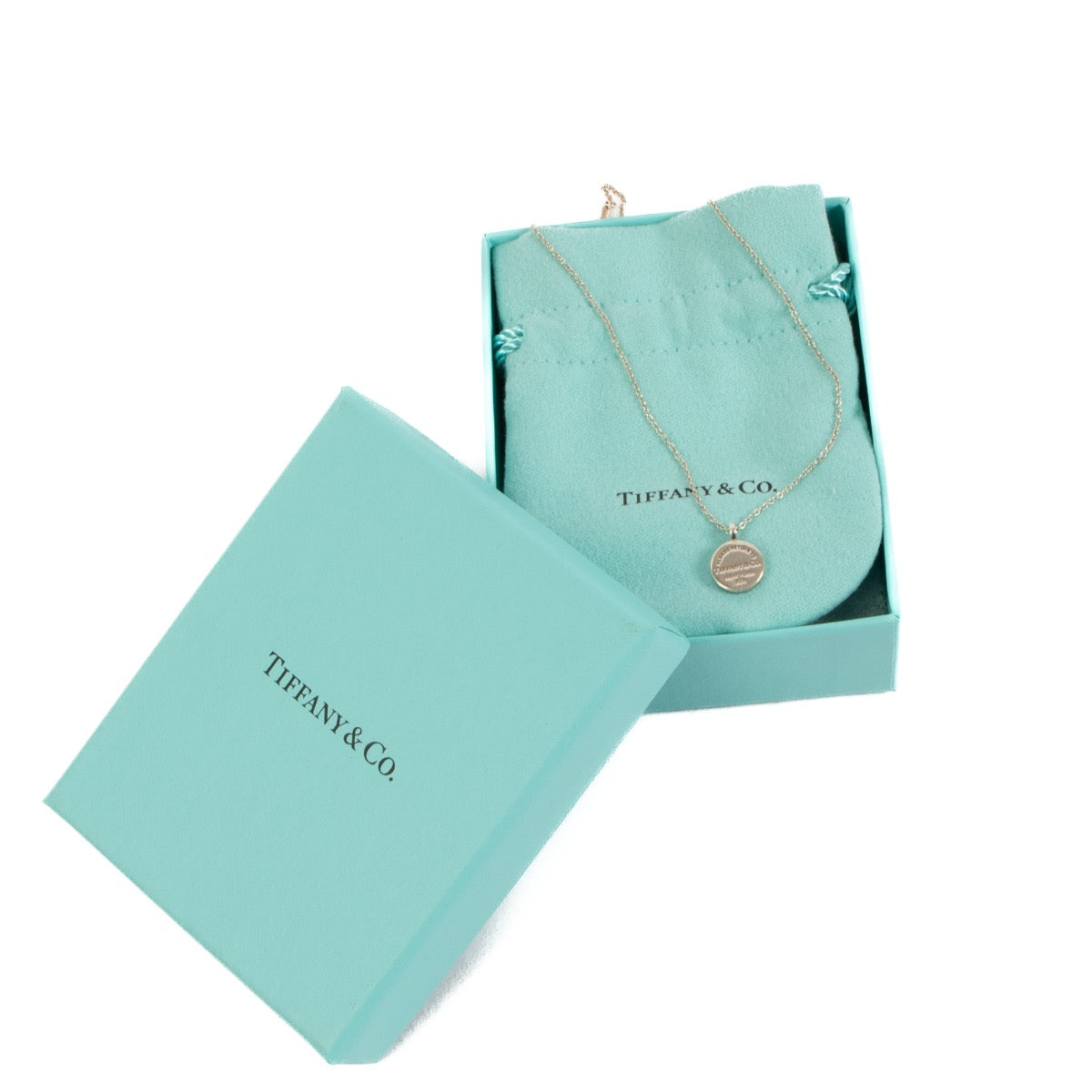 Shop safe online at Labellov in Antwerp, Brussels and Knokke this 100% authentic second hand Tiffany & Co Silver Rit Round DTag Pendant Necklace