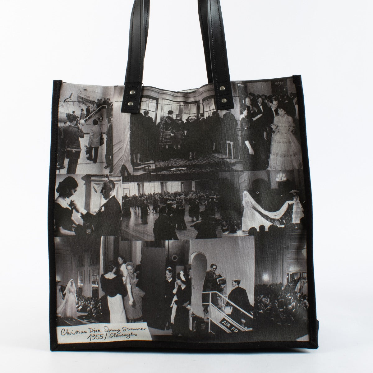 Christian Dior Cruise 2025 printed canvas tote bag with black leather handles at Labellov.com