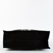 Christian Dior Cruise 2025 printed canvas tote bag with black leather handles at Labellov.com