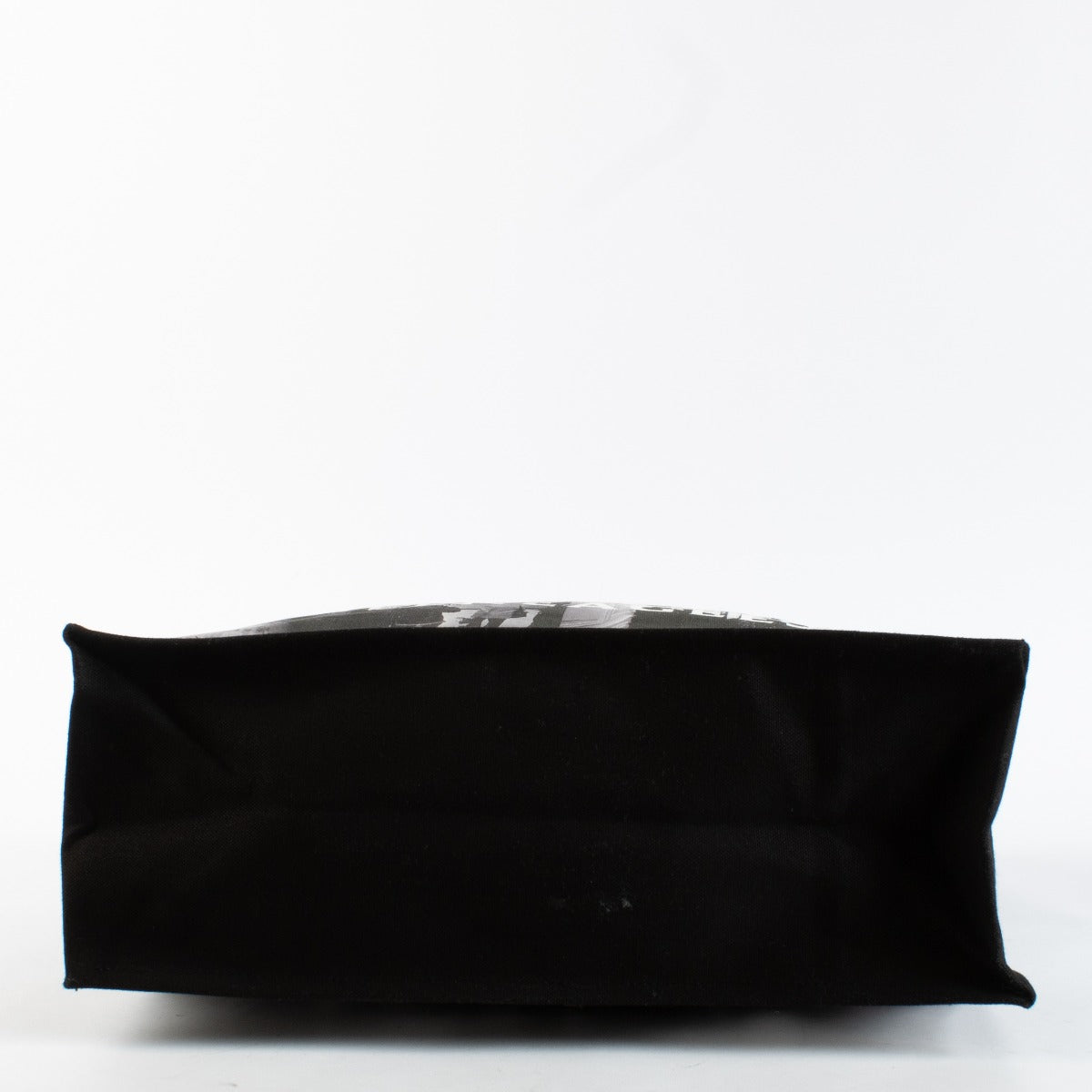 Christian Dior Cruise 2025 printed canvas tote bag with black leather handles at Labellov.com