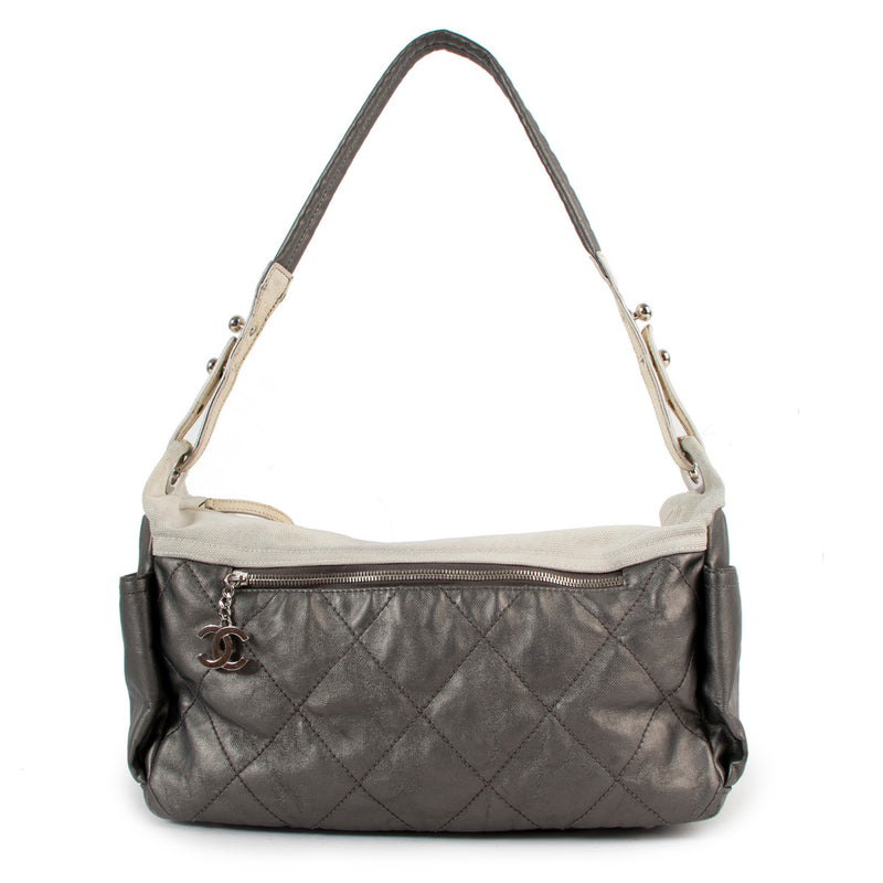This gorgeous Chanel Large Silver and Cream Quilted Biarritz Paris Shoulder Bag is now online at Labellov secondhand luxury in Antwerp