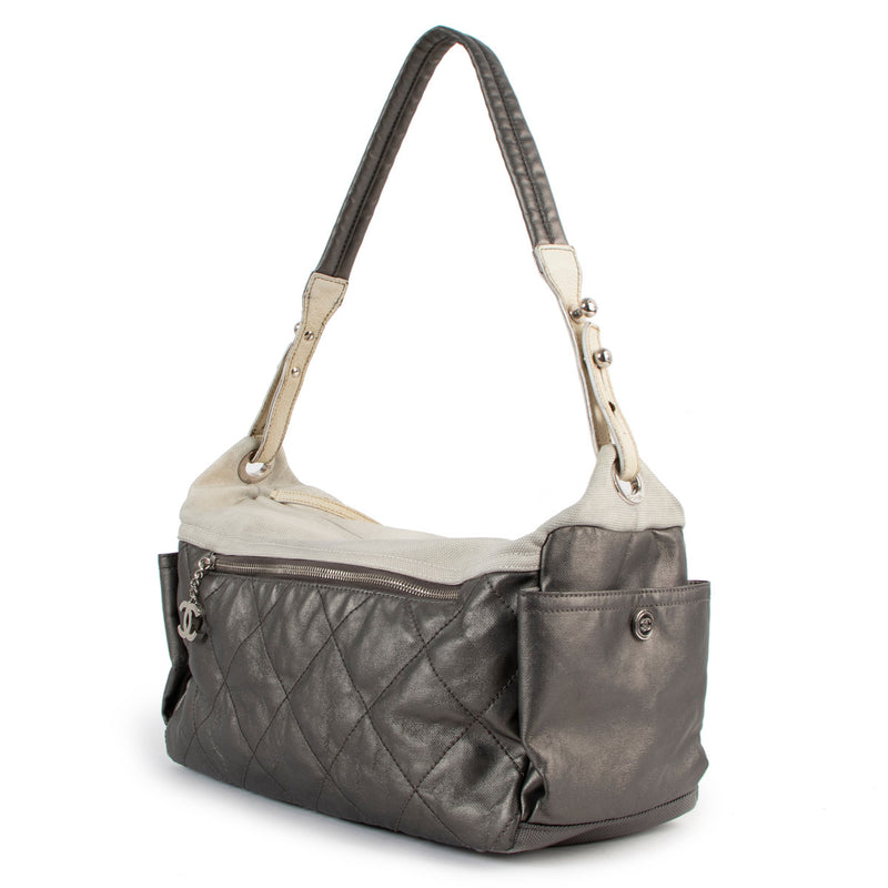 Are you looking for an authentic designer bag such as Chanel Large Silver and Cream Quilted Biarritz Paris Shoulder Bag ?