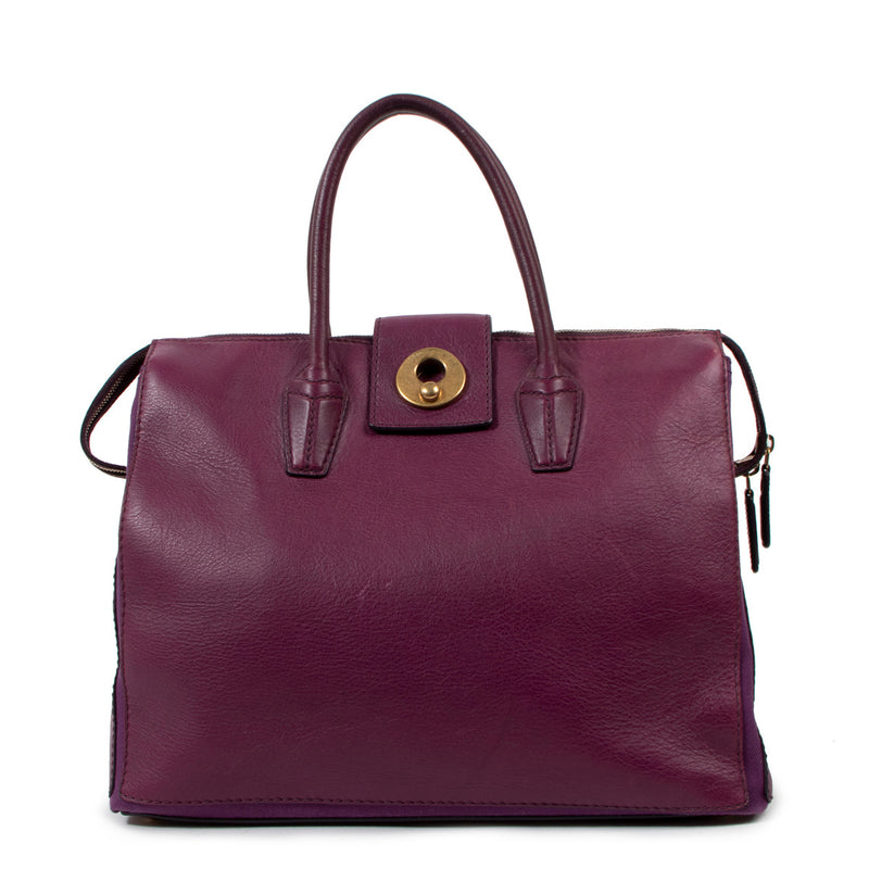 Yves Saint Laurent Vintage Muse Purple Leather Bag for the best price at Labellov secondhand luxury in Antwerp
