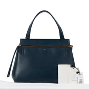 Celine Deepsea Blue Medium Edge Top Handle Bag complete with dust bag and booklet available with direct shipping or free pickup in Antwerp Brussels Knokke with Labellov luxury designer vintage shop