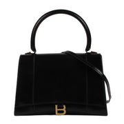 Shop safe online at Labellov in Antwerp, Brussels and Knokke this 100% authentic second hand Balenciaga Black Medium Hourglass Top Handle + Strap