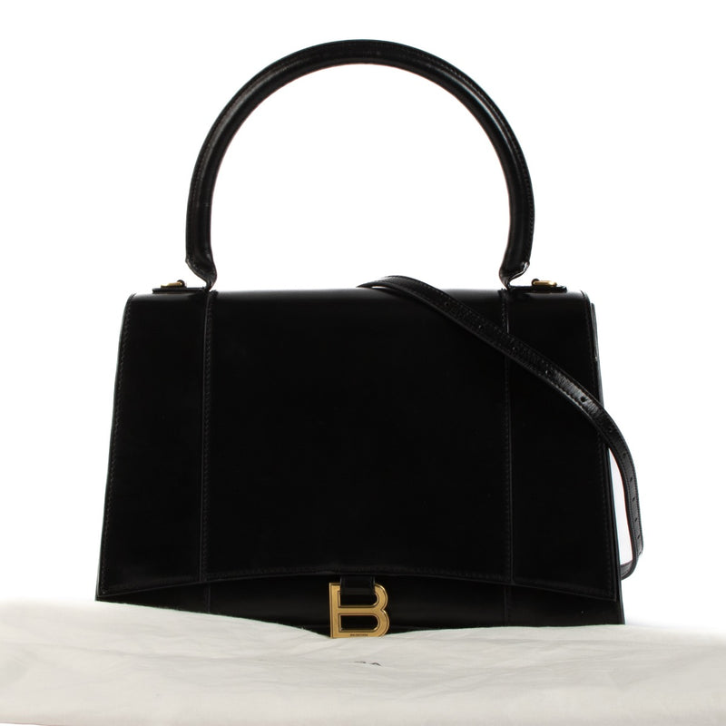 Shop safe online at Labellov in Antwerp, Brussels and Knokke this 100% authentic second hand Balenciaga Black Medium Hourglass Top Handle + Strap