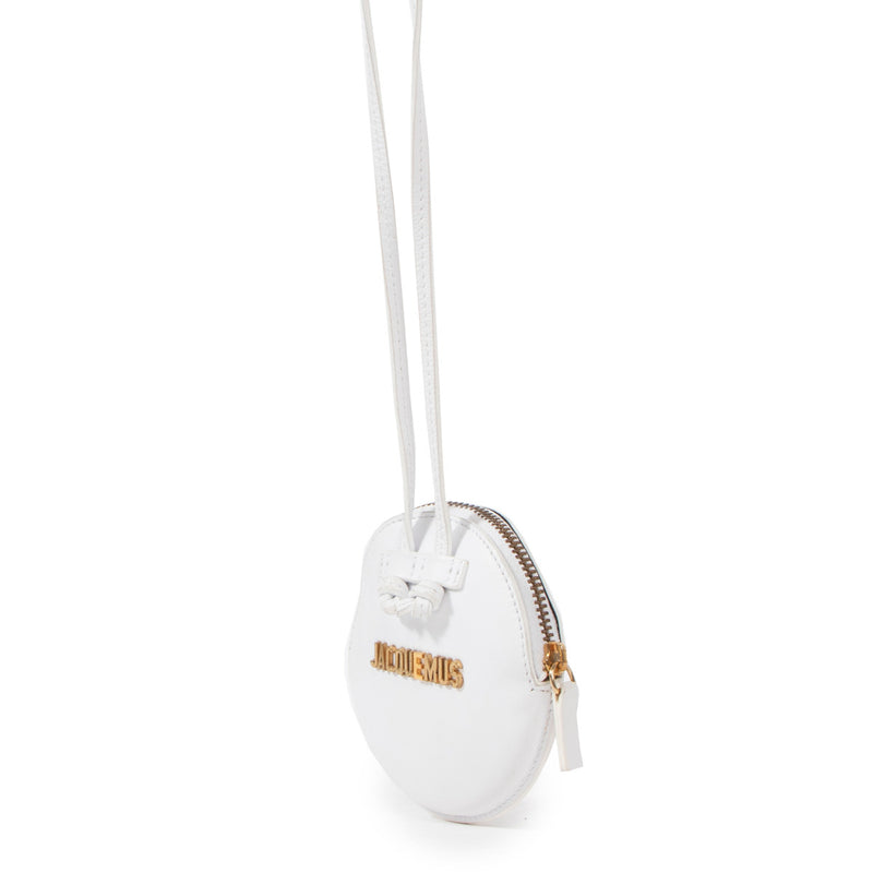 Jacquemus White Mini Le Pitchou Necklace Bag for the best price at Labellov secondhand luxury in Antwerp.