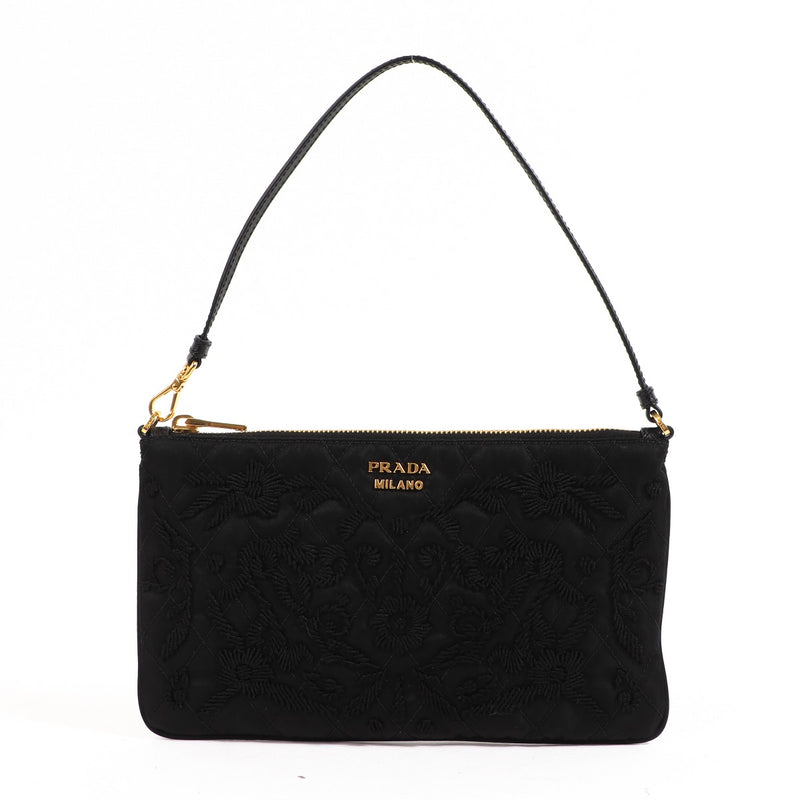 Buy an authentic second-hand Prada Black Nylon Tessuto Impuntu Nylon Pochette in very good condition at Labellov in Antwerp.