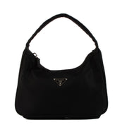 Shop safe online at Labellov in Antwerp, Brussels and Knokke this 100% authentic second hand Prada Black Nylon Mini Bag