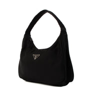 Shop safe online at Labellov in Antwerp, Brussels and Knokke this 100% authentic second hand Prada Black Nylon Mini Bag