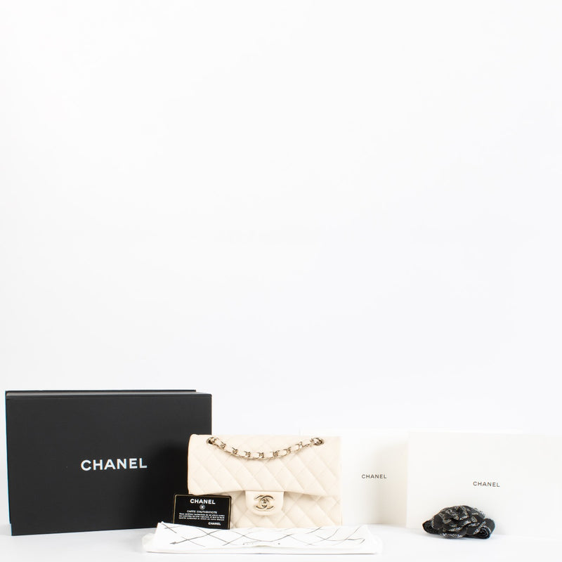 Authentic Second Hand Chanel Cream Caviar Small Classic Flap bag on Labellov.com