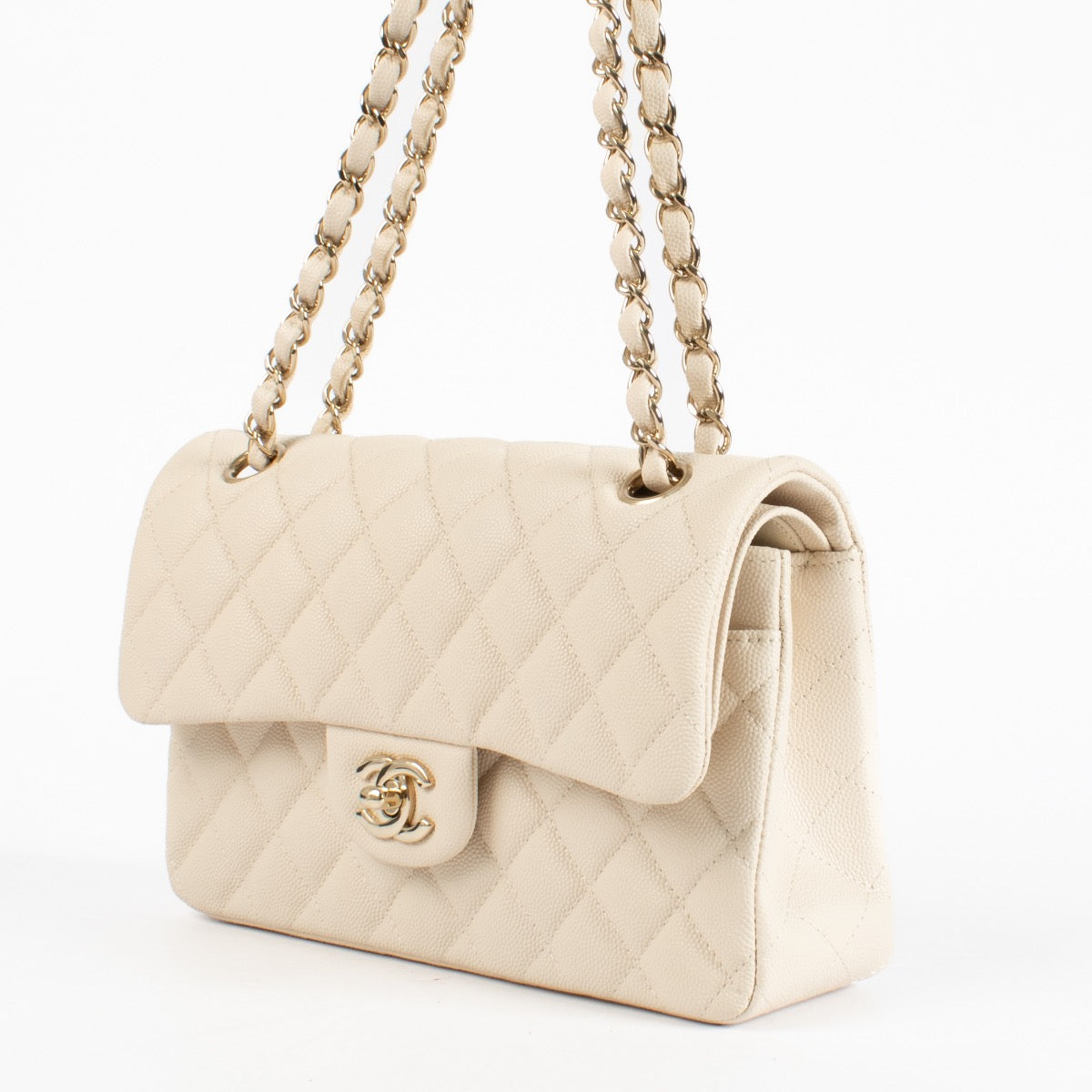 Authentic Second Hand Chanel Cream Caviar Small Classic Flap bag on Labellov.com