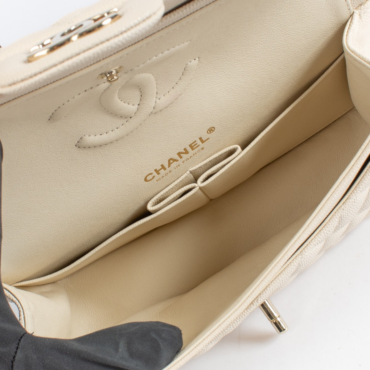 Authentic Second Hand Chanel Cream Caviar Small Classic Flap bag on Labellov.com