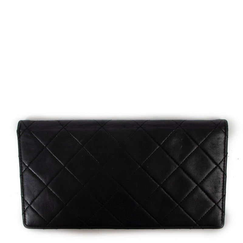 Buy a 100% authentic second hand vintage Chanel Black Leather Lambskin Wallet in pre-loved condition at Labellov