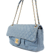 Shop safe online at Labellov in Antwerp, Brussels and Knokke this 100% authentic second hand Chanel Blue Iridescent Calfskin Medium Classic Flap Bag.