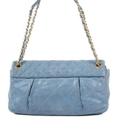 Shop safe online at Labellov in Antwerp, Brussels and Knokke this 100% authentic second hand Chanel Blue Iridescent Calfskin Medium Classic Flap Bag.