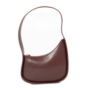 Shop safe online at Labellov in Antwerp, Brussels and Knokke this 100% authentic second hand The Row Raisin Shiny Kid Leather Half Moon Bag. Veilig online tweedehands authentieke The Row Raisin Shiny Kid Leather Half Moon handtas kopen bij Labellov.